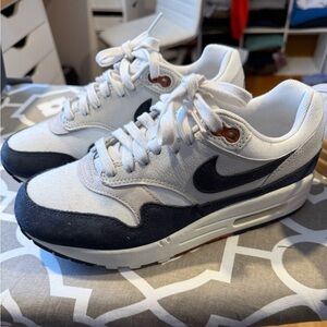 Nike Woman’s White and Black Sneakers